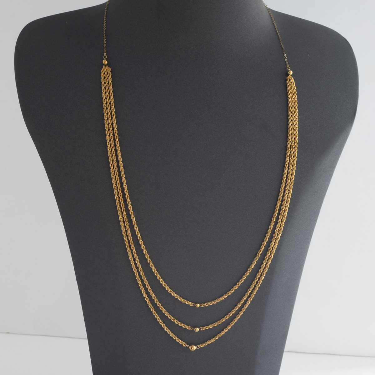 Twisted 3 Line Longchain 21K Gold